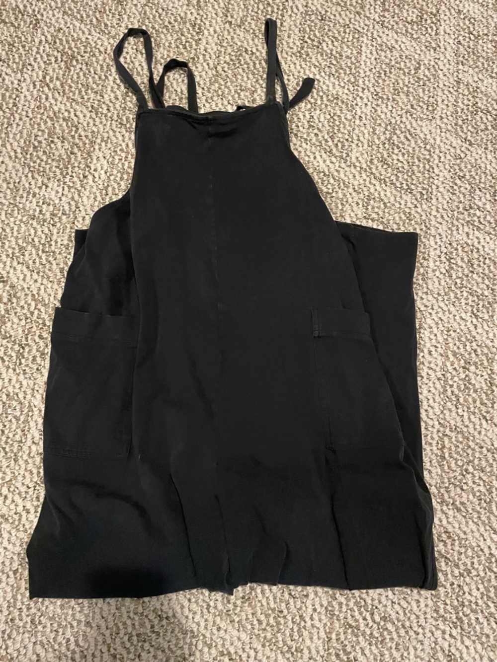 Quince Black Sleeveless Jumpsuit with Thin Straps works for maternity also!